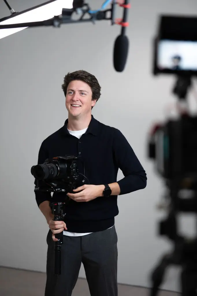 Antoine Similon on a film set, operating a camera gimbal